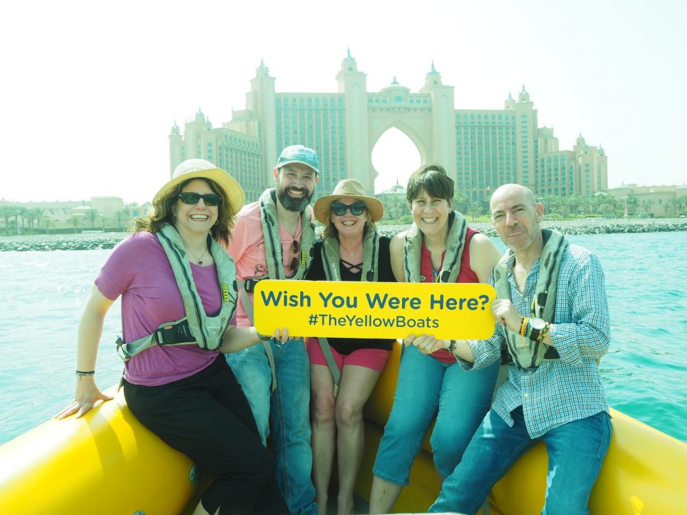 My friends and I at one of our photo stops, in front of the Atlantis the Palm Hotel. For the "room" over the arch, the "royal bridge suite," 924 square meters, prices start at over 10,000 euros a night.