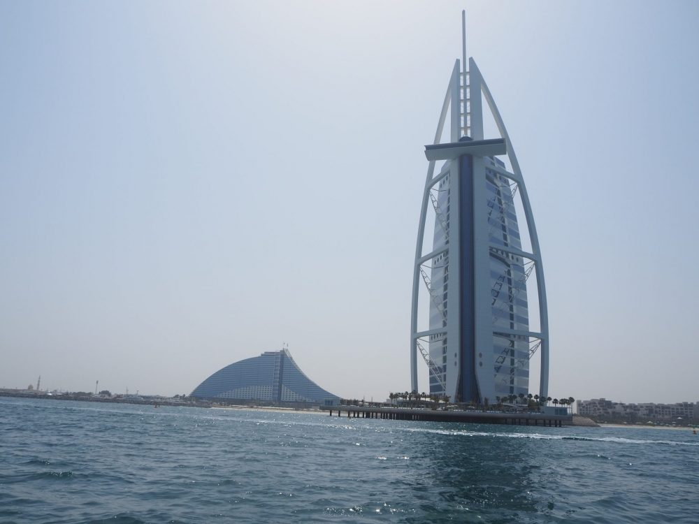 The Burj Al Arab as seen from the water. That interestingly-shaped building behind it is the Jumeirah Beach Hotel.