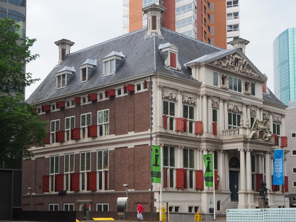 Schielandshuis is a square stately building in brick with a columned entrance. The whole front facade is embelllished with columns between the windows and ornate statuary above the windows, especially on the central pediment. 