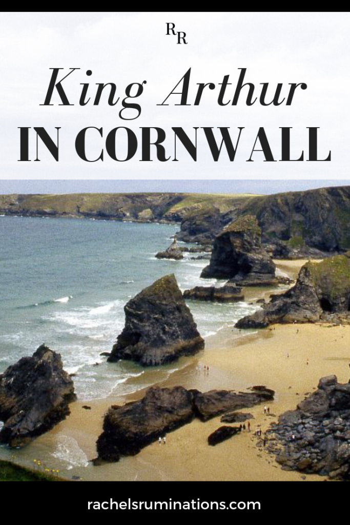 Text: King Arthur in Cornwall. Image: a rocky Cornwall beach.