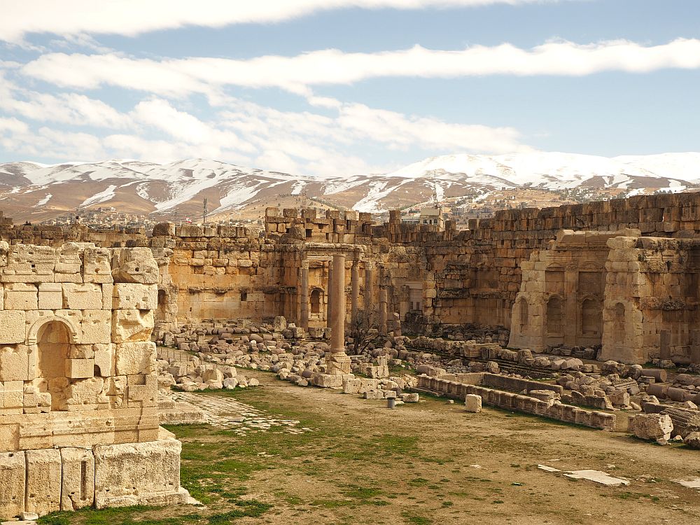 The outer walls of the complex look intact in this shot, with the neat Roman-era stone for most of the wall, but with just a few rows of rougher, darker stone on top of that. The rubble seems to be in neat lines in this part of the complex.
Baalbek ruins, Lebanon.