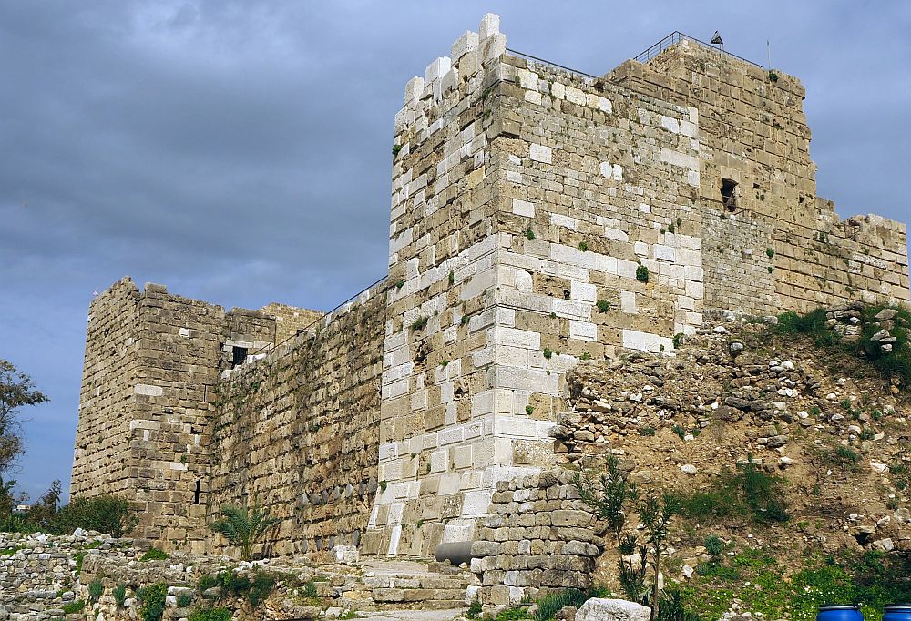 Byblos castle is made of solid walls of large blocks of stone with no windows.