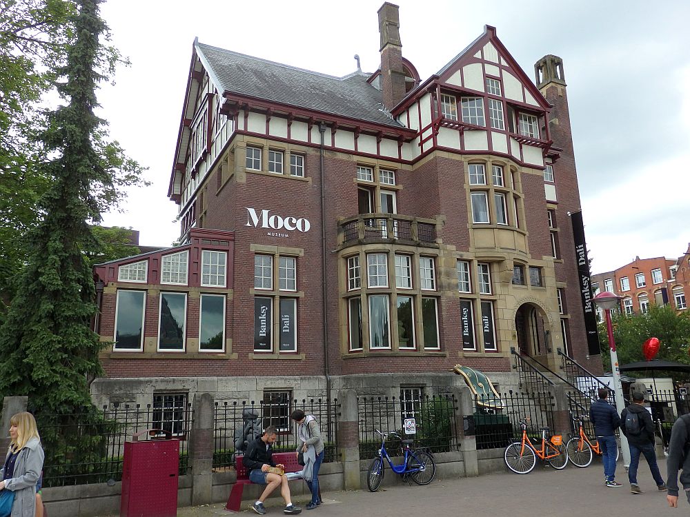 The Moco Museum in Amsterdam is in what used to be a large house. It's a bit of a mishmash of styles, red brick with concrete around the windows and some half-tudor elements on the top floor.