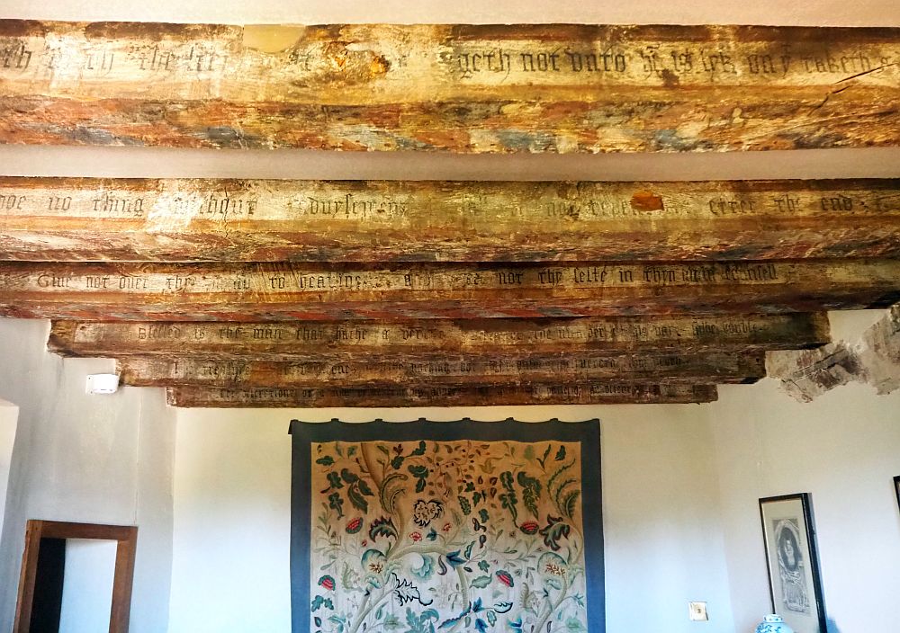 faded paint is visible on the wooden beams that make up the ceiling in this small room in Crathes Castle in Scotland