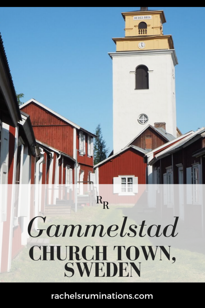 Pinnable image
Image: small red houses on either side, with a tall white church tower in the background.
Text: Gammelstad church town