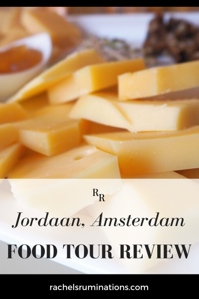 Pinnable image:
Text: Jordaan, Amsterdam Food Tour Review
Image: close-up of blocks of cheese