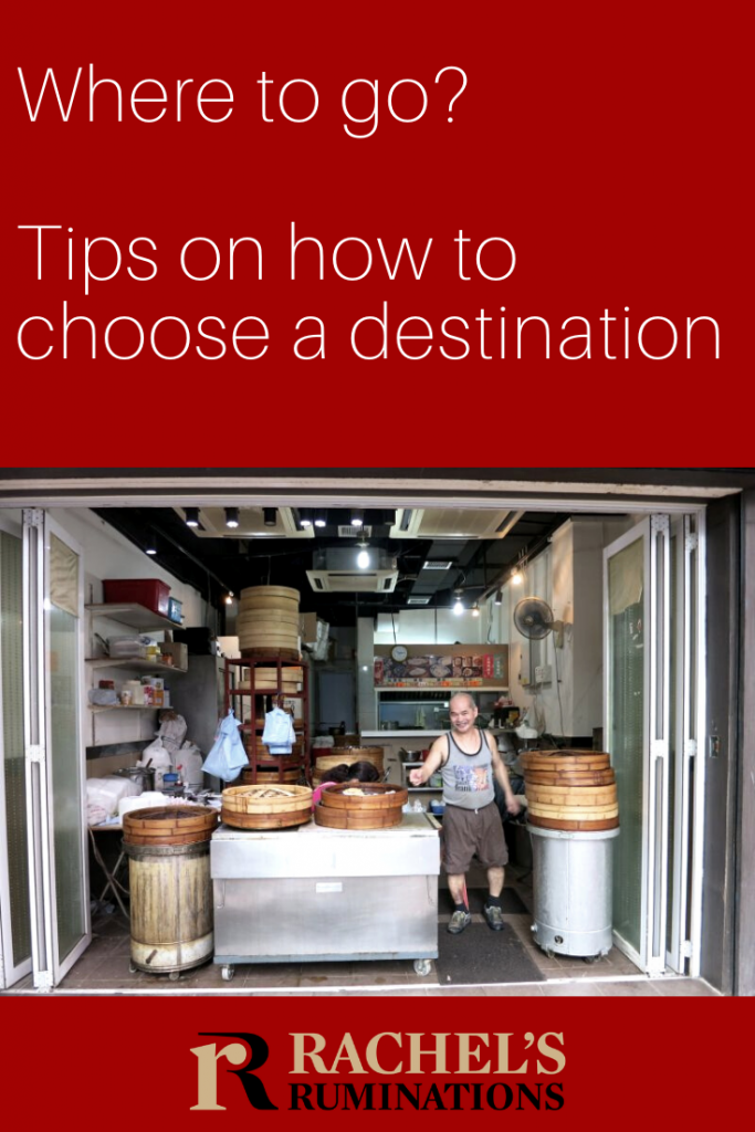 PInnable image Text: Where to go? Tips on how to choose a destination Image: a dim sum seller in Hong Kong poses with his steam baskets on display