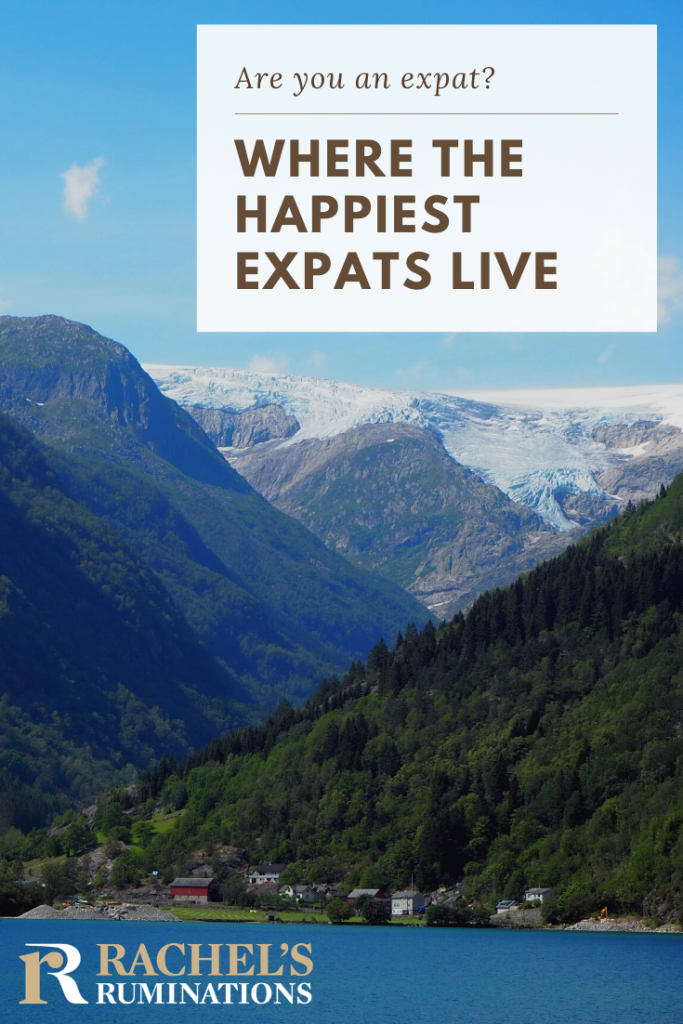 Pinnable image: 
Image: the same photo as above of the village with mountains looming around it. 
text: Are you an expat? Where the happiest expats live. (and a Rachel's Ruminations logo.