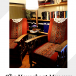 Text: Ever thought of living in a houseboat? The Houseboat Museum, Amsterdam. Image: comfy chairs in a corner of the museum.