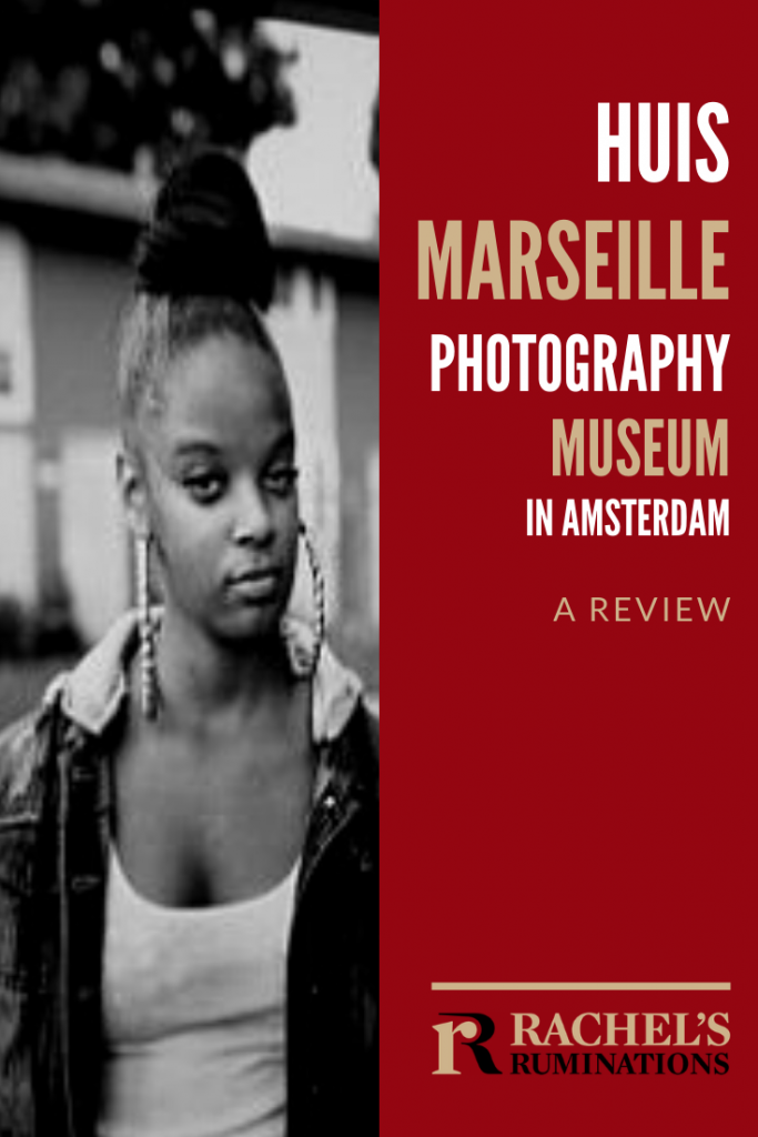 Pinnable image
Text: Huis Marseille Photography Museum in Amsterdam: A review (and the Rachel's Ruminations logo)
Image: a young African-American woman with her hair on top of her head in a bun, large dangling earrings, looking at the camera with half-open eyes.