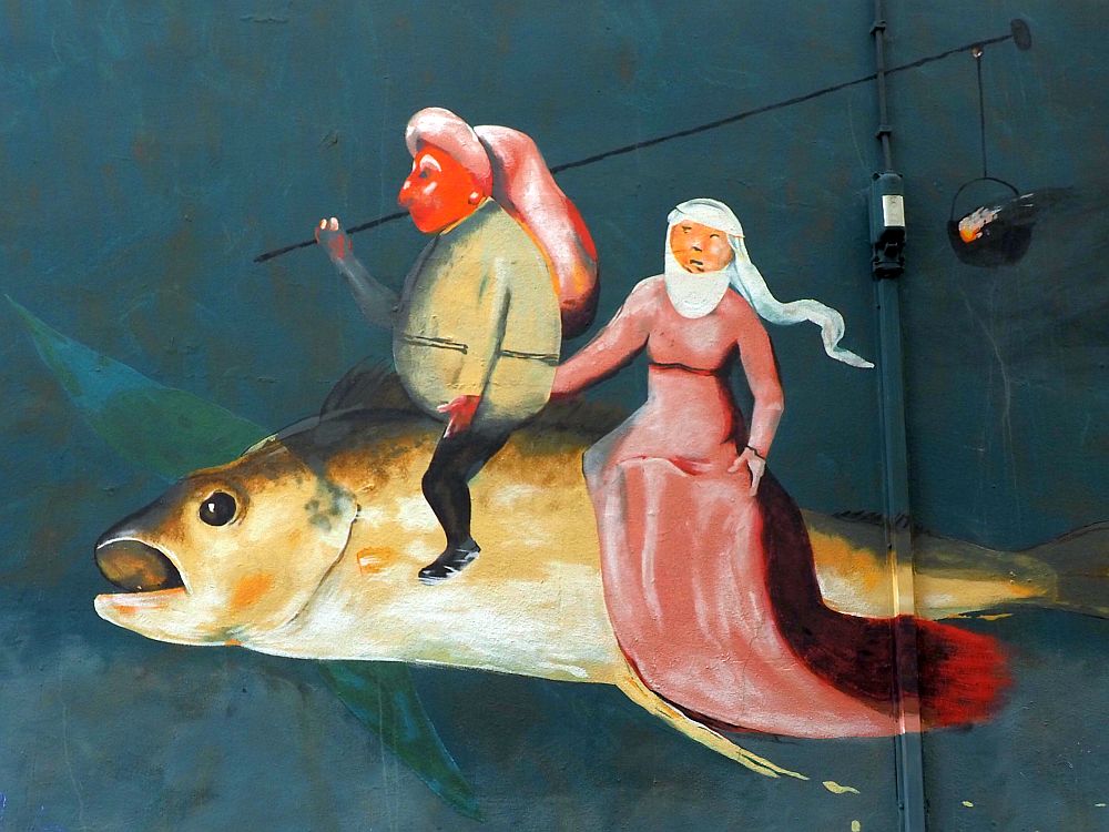 A painting of a fish with two figures sitting on it. Nearer the fish's head a man straddles it like a horse. He has long hair like a pony tail (or is it a woman?). He has a pole leaning on his shoulder and extending back to the tail of the fish. Behind him sits a woman in a long pink dress that trails behind. She sits sidesaddle. She also has a veil around her head. 