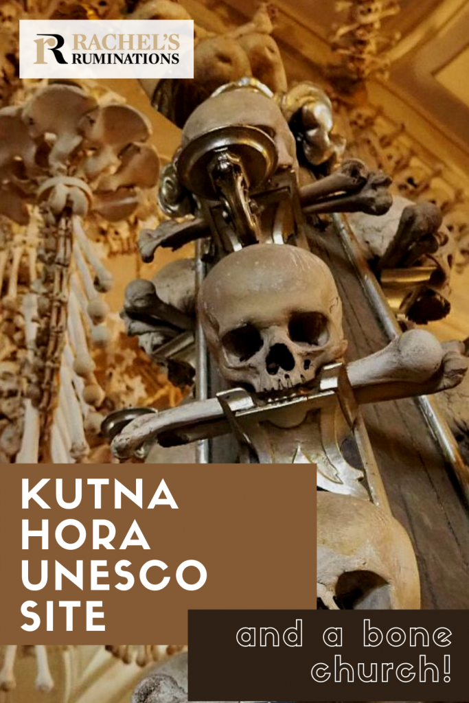 Pinnable image
Text: Kutna Hora UNESCO site and a bone church
Image: the stand with skulls appearing to have long bones in their mouths.