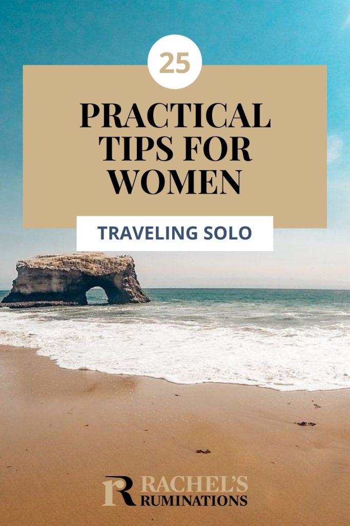 Text: 25 practical tips for women traveling solo. Image: a beach with a rock in the water that has a hole carved out of it by the wave action.