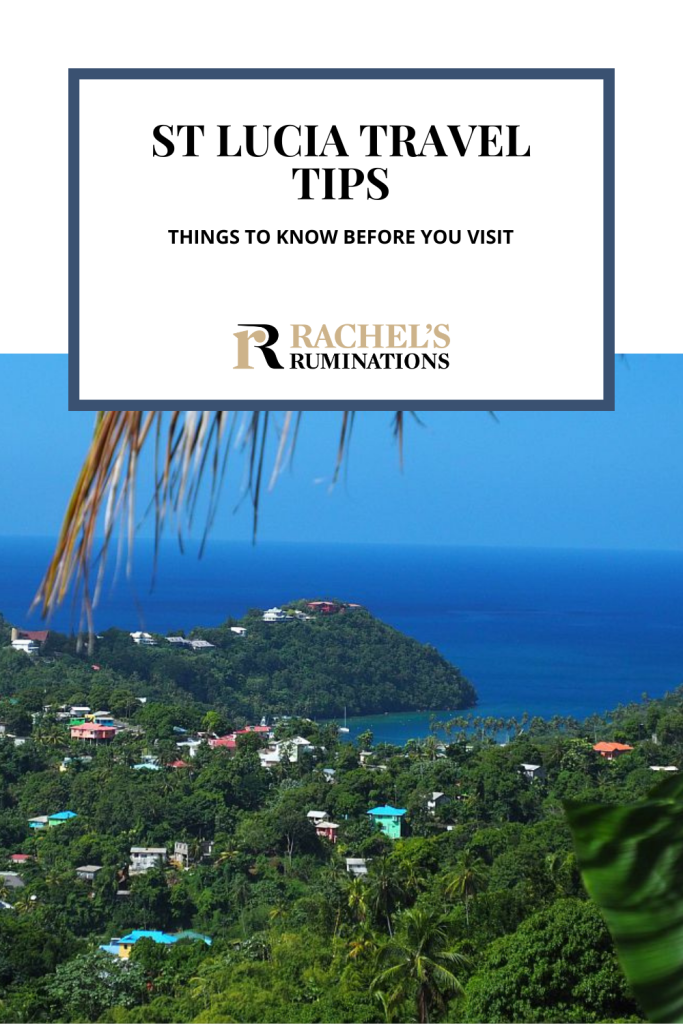 Text: St Lucia travel tips: things to know before you visit (and the Rachel's Ruminations logo). Image: a view from a hill over green woodsy countryside dotted with brightly-painted houses, the deep blue of the sea beyond that.