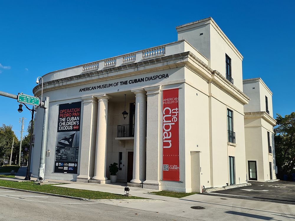 A rather stately building but only 3 stories high and not very wide at all, with pillars on either side of the entrance, painted white. It looks like it was once a bank building. While it refers to the Cuban diaspora, it doesn't really cover the whole history of Little Havana.