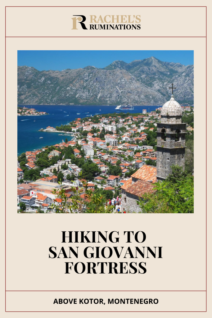 Text: Hiking to San Giovanni Fortress above Kotor, Montenegro (and the Rachel's Ruminations logo). Image: view down onto Kotor from halfway up.