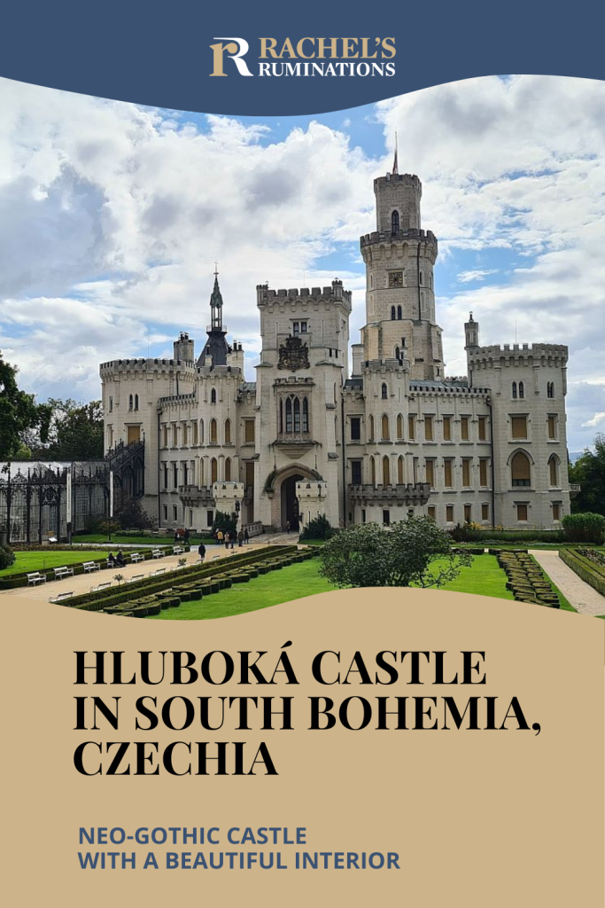 Text: Hluboká Castle in South Bohemia, Czechia: neo-gothic castle  with a beautiful interior. Image: an exterior view of the castle.