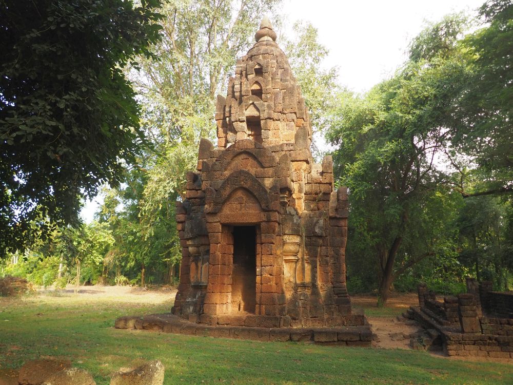 A small temple: square base with about five levels on top, tapering to a point.