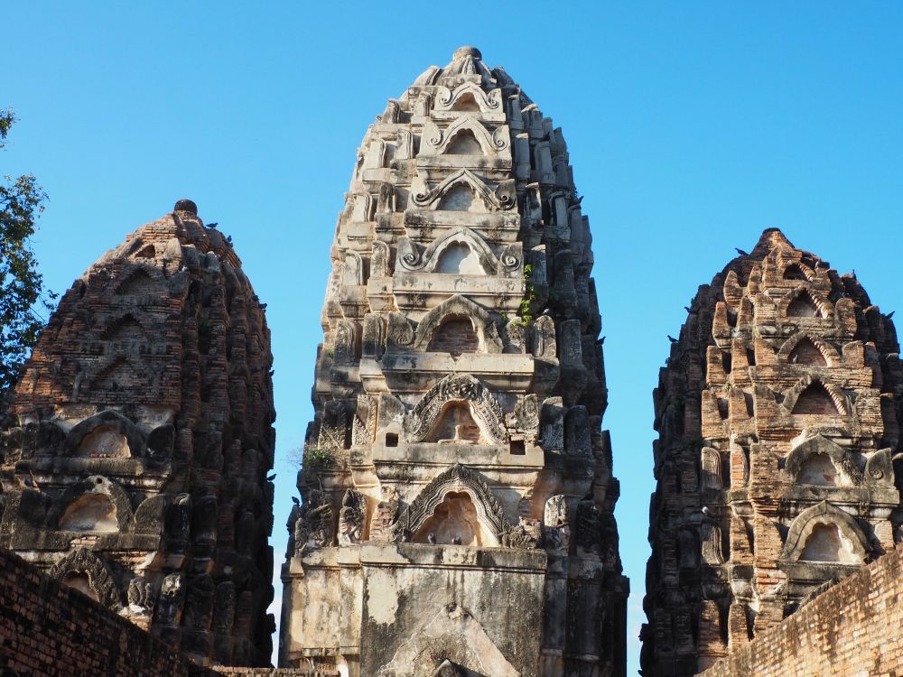 Three prangs, each with seven levels, some of which still have their original stucco carvings.