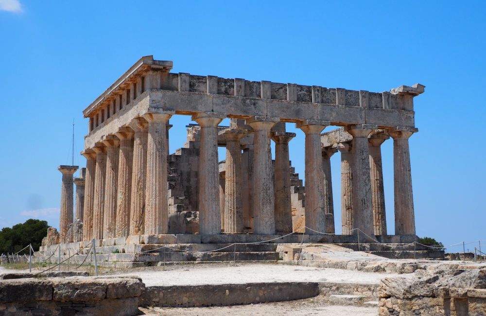 A classical Greek temple, looking like a smaller version of the temple at the Acropolis in Athens - with Doric columns still holding up the lintel on 3 sides.