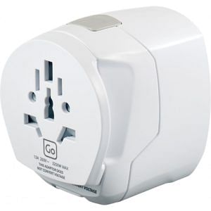 The adapter is white and more or less in the shape of a cube. It has a number of holes at the near end, where a plug from anywhere in the world can be inserted. The USB ports are not visible in this photo.