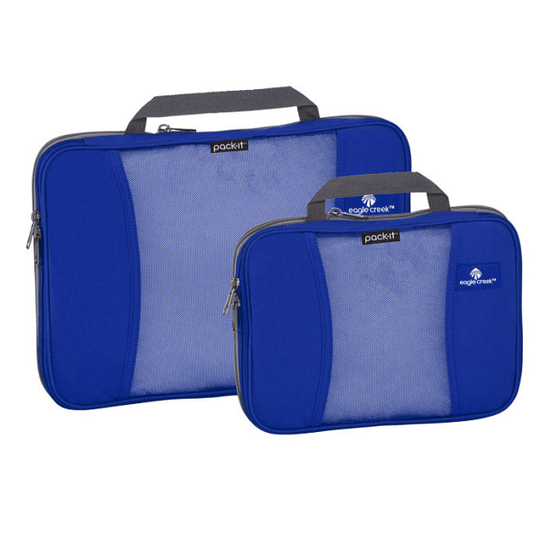 Two blue packing cubes. They're not actually cubes. They are rectangular and shaped like a briefcase but smaller, with a small cloth handle at the top.