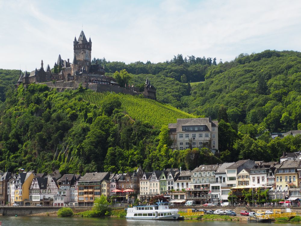 Reichsburg Castle on a hill above the riverside town.