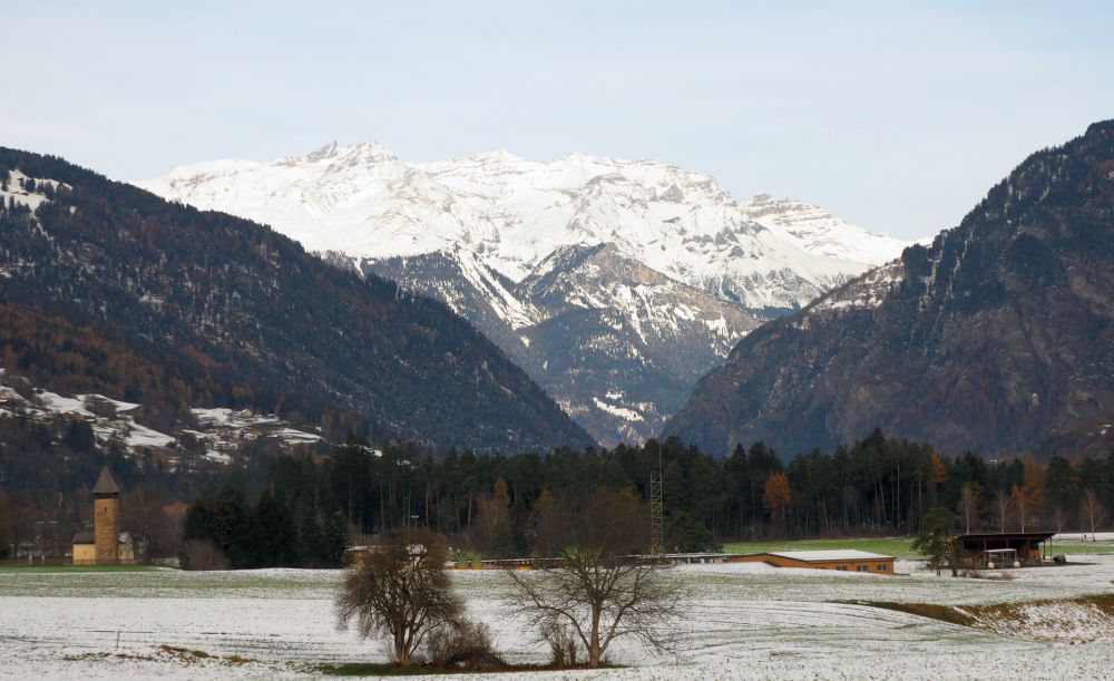 A mountain view, snow-capped.