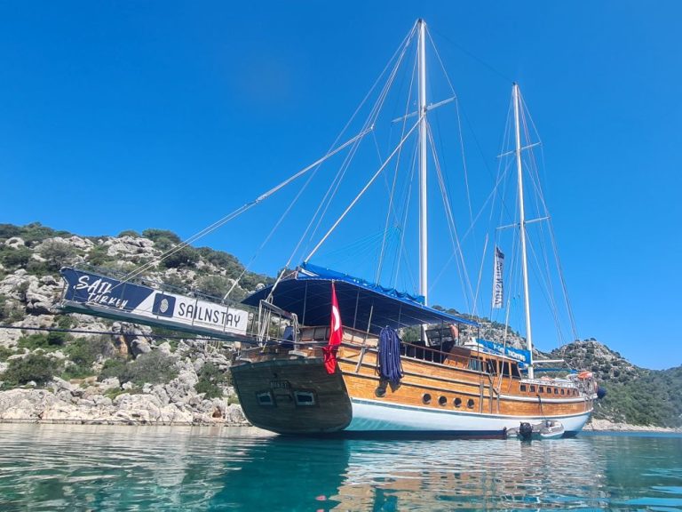 The gulet is a wooden boat with two masts.