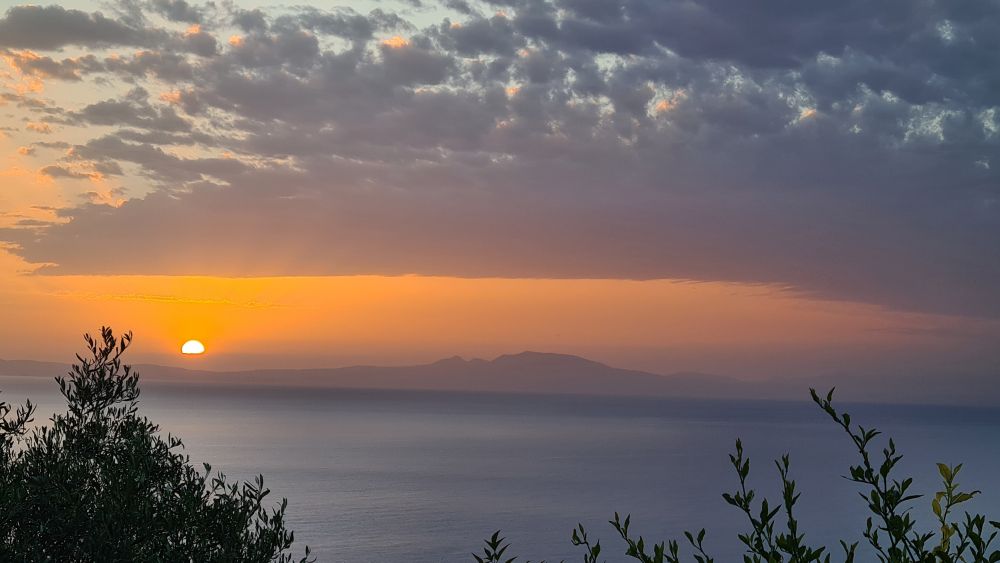 A sunset over the water at Bassa Maina.
