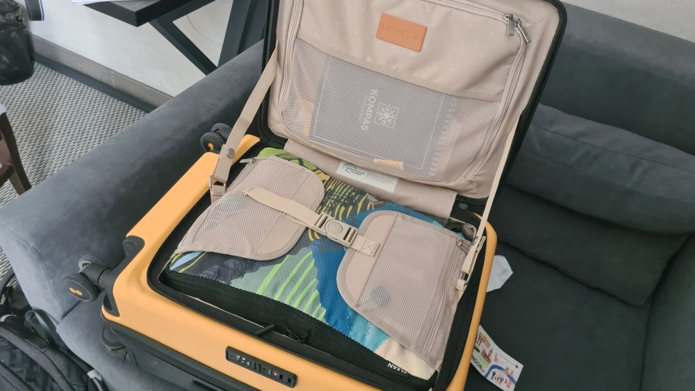 The open bag, now with the strap across the middle fastened.