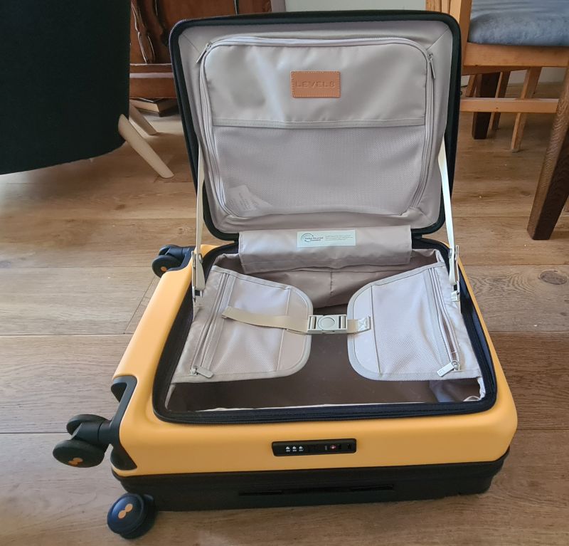 The bag is open and empty, with the cinch strap closed across the empty interior.